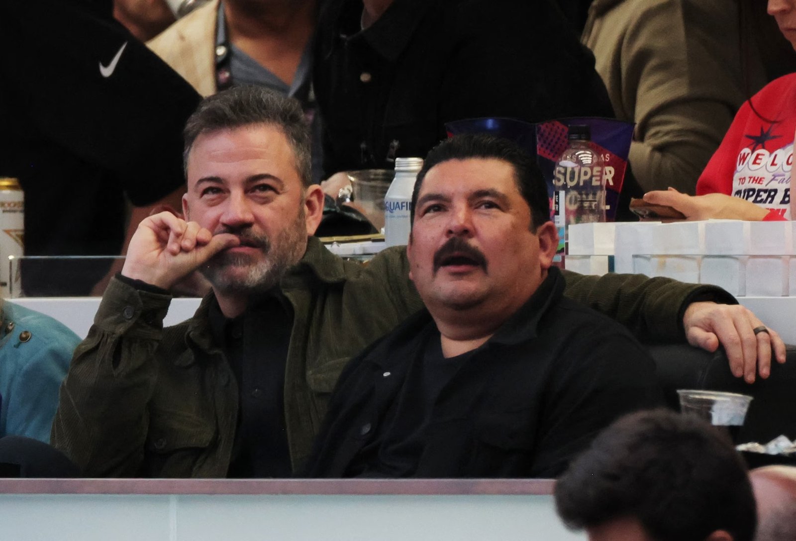 Jimmy Kimmel and Guillermo Rodriguez watch Super Bowl LVIII, in Las Vegas, Feb. 11, 2024.