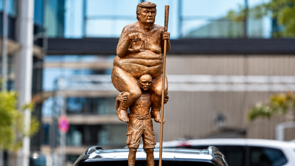 orange plague trump statue