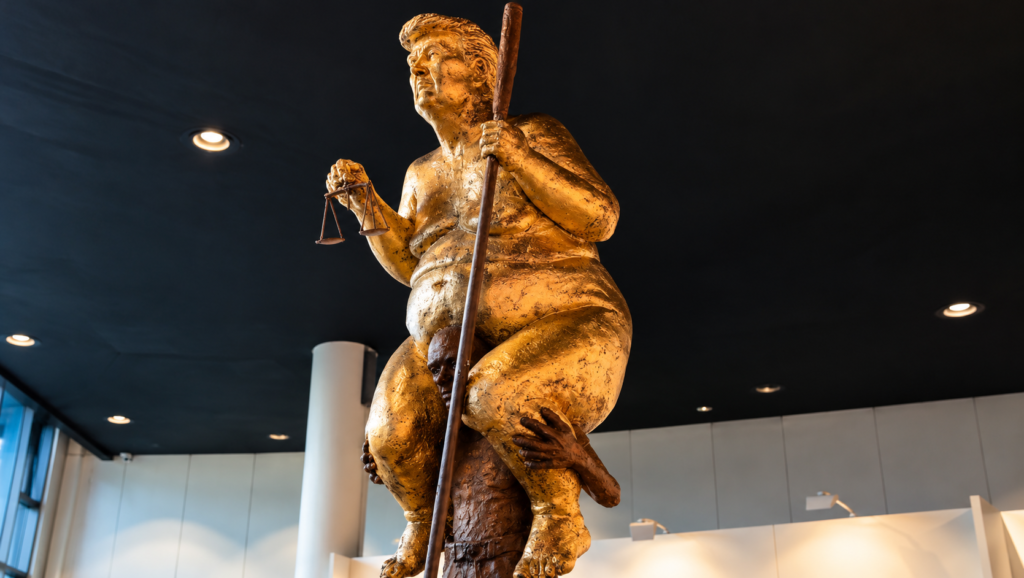 orange plague trump statue